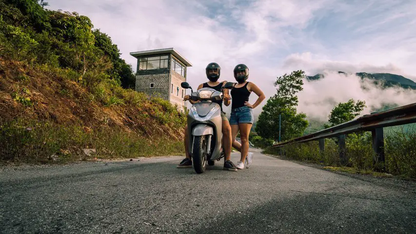 Arijana and Matej with scooter on Hai Van Pass