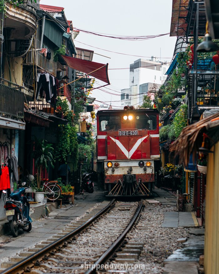 Train coming through Hanoi's Train Street