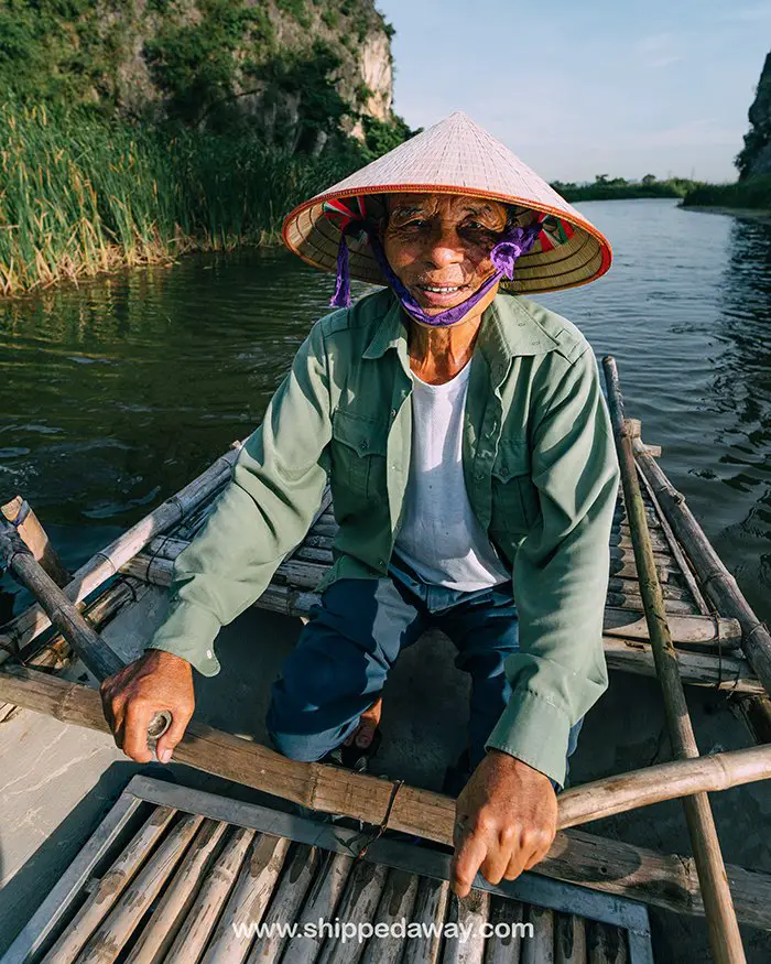 Rower at Van Long Nature Reserve boat ride in Vietnam