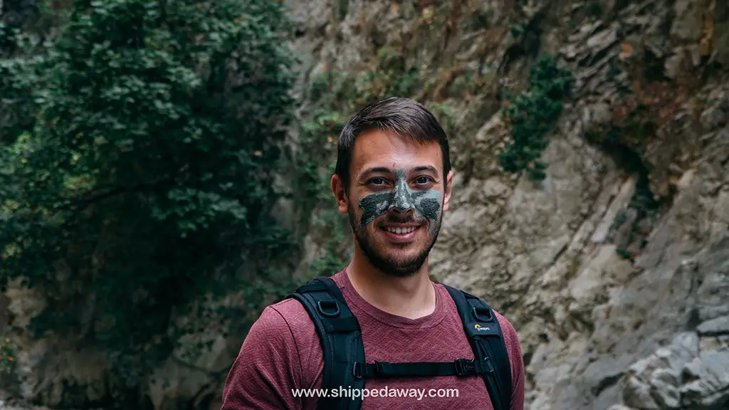 Using mud at Saklikent Gorge as facial mask