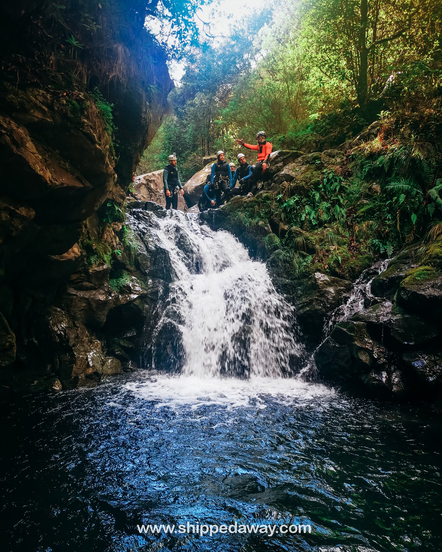 Jumping from a waterfall in Ribeiro Frio, Madeira