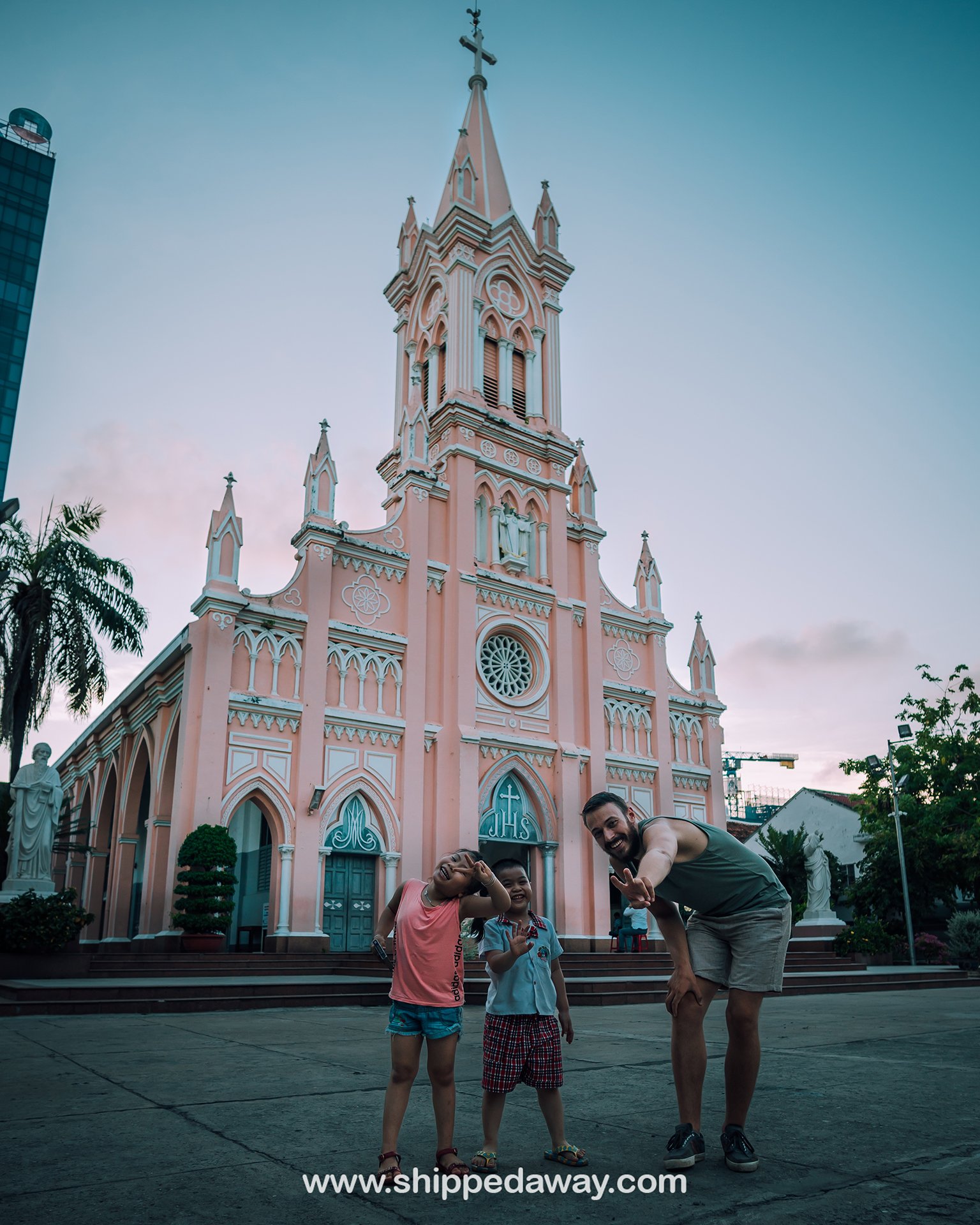 Matej Špan with Vietnamese kids in front of Da Nang Cathedral