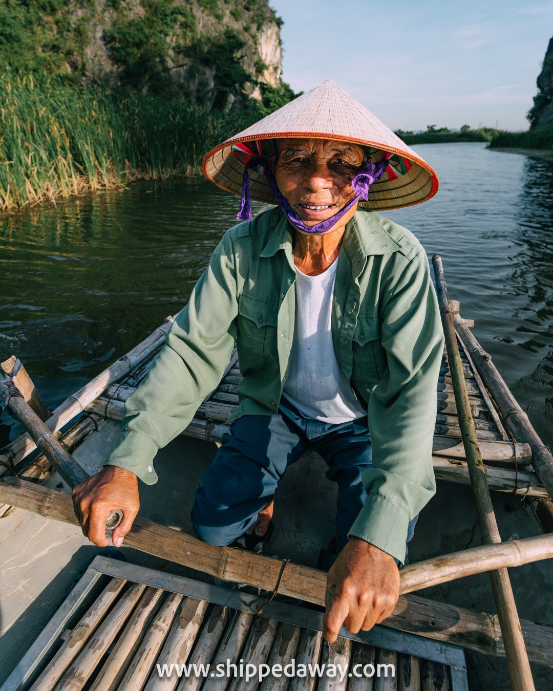 Local rower in Van Long Nature Reserve in Ninh Binh