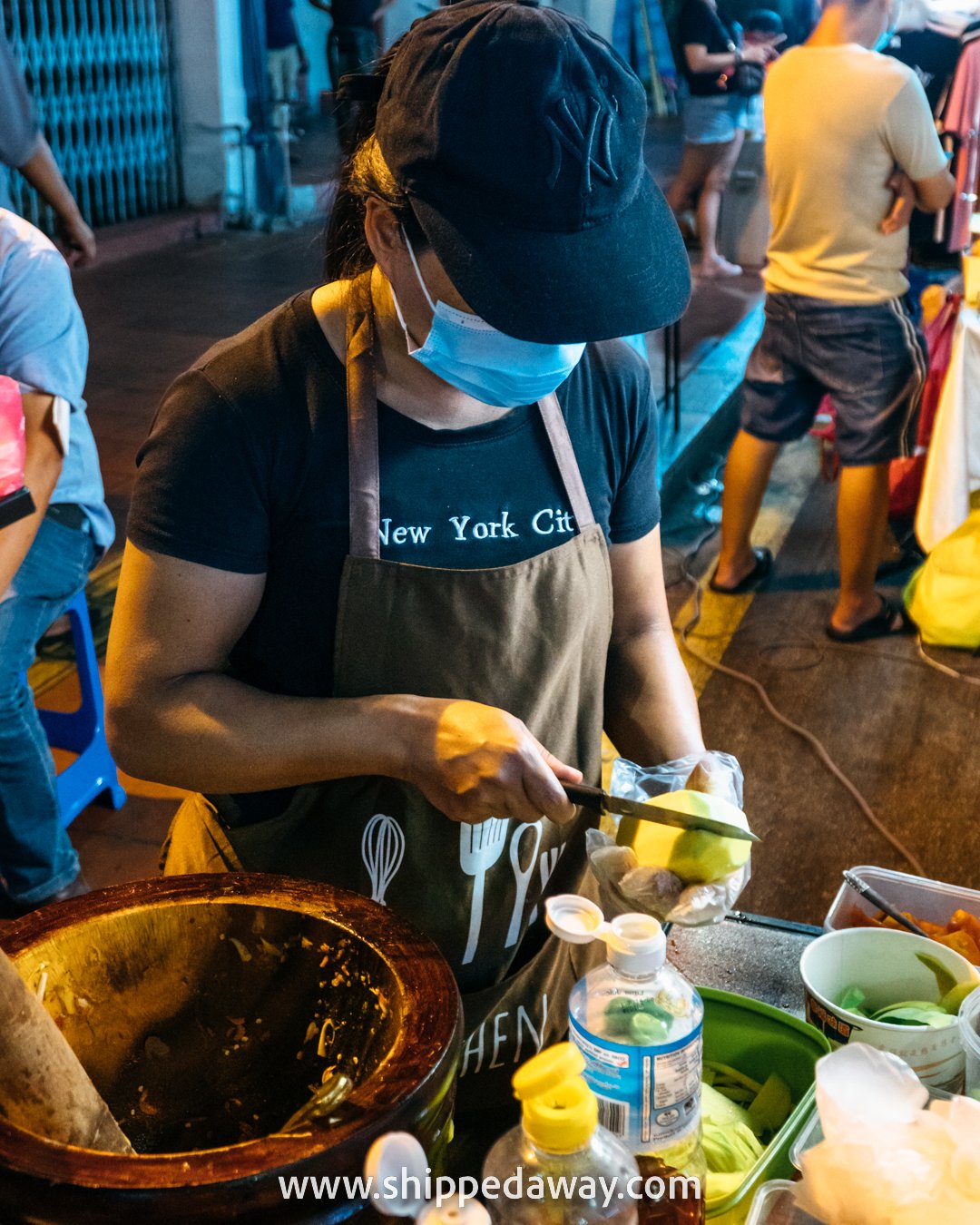 Papaya salad preparation at Jonker Street Night Market, Melaka (Malacca), Malaysia