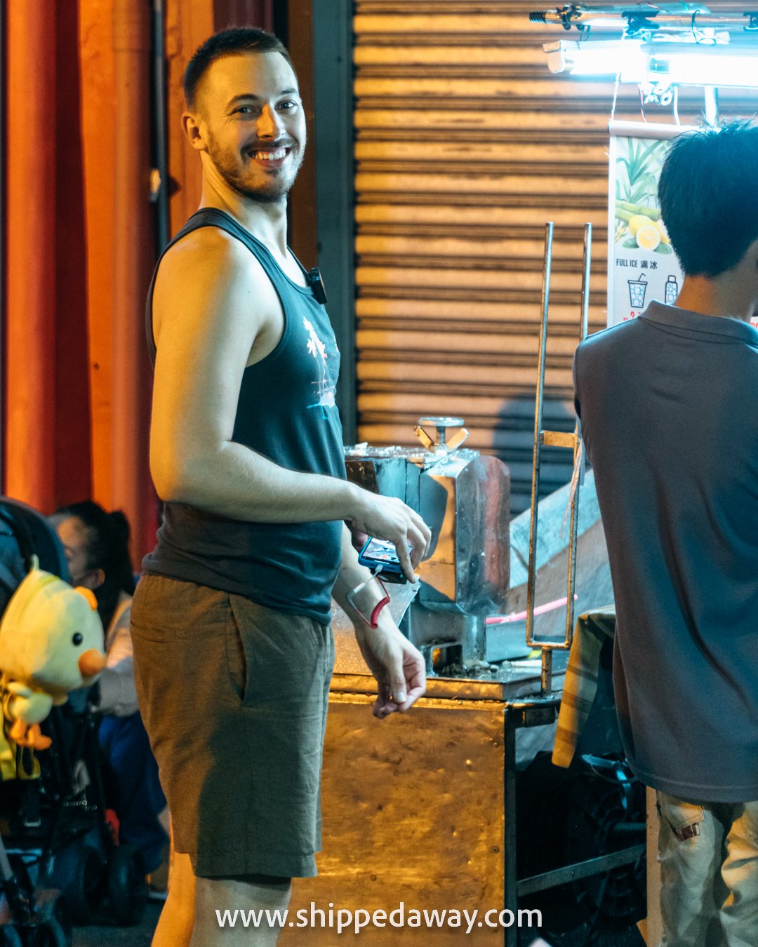 Matej Špan happy at sugarcane juice stand at Jonker Street Night Market, Melaka (Malacca), Malaysia