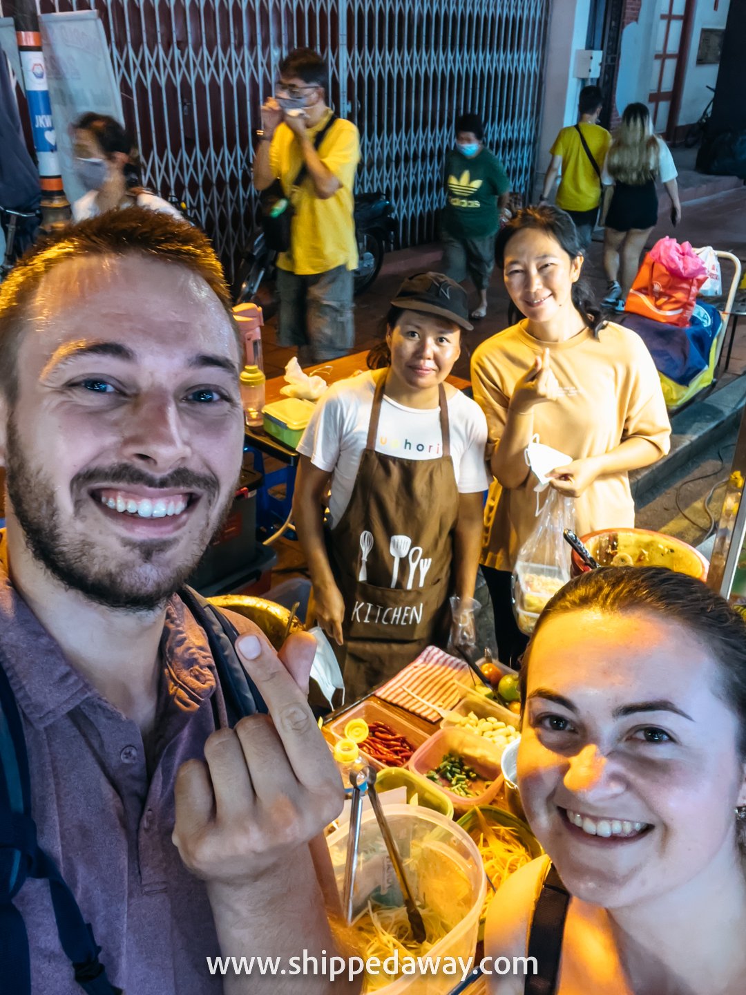 Arijana Tkalčec and Matej Špan hanging with the papaya salad ladies at Jonker Street Night Market, Melaka (Malacca), Malaysia