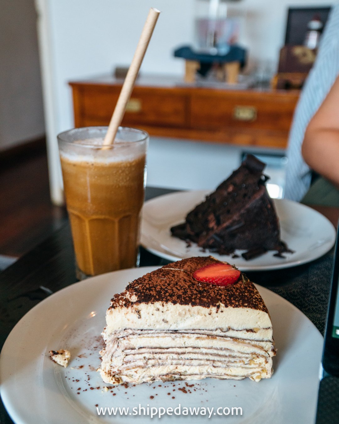 Tiramisu and chocolate cakes and coconut coffee at Eastern and Oriental Tea House, Hanoi, Vietnam