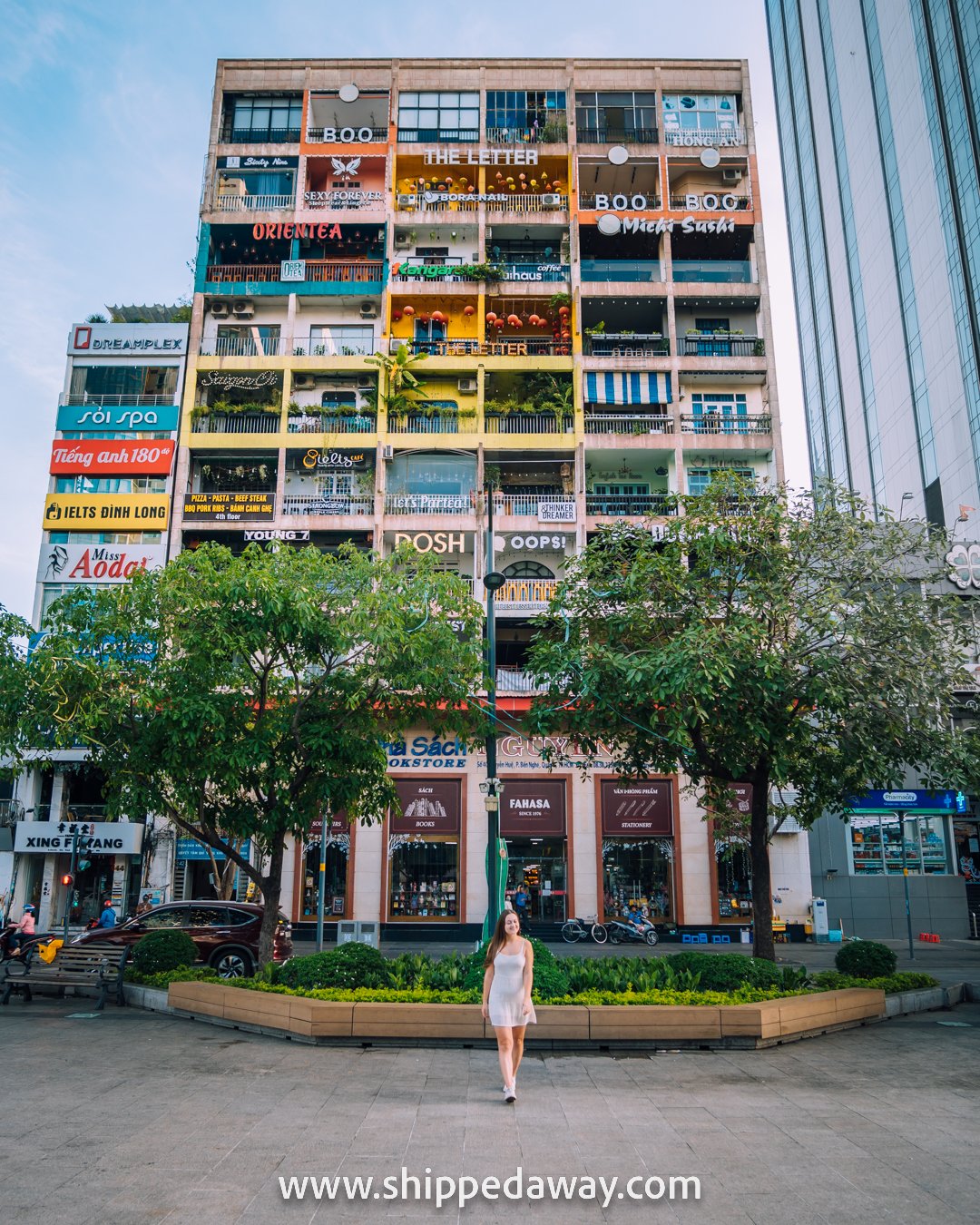 Arijana Tkalcec in front of Cafe Apartments Building, Ho Chi Minh City, Vietnam