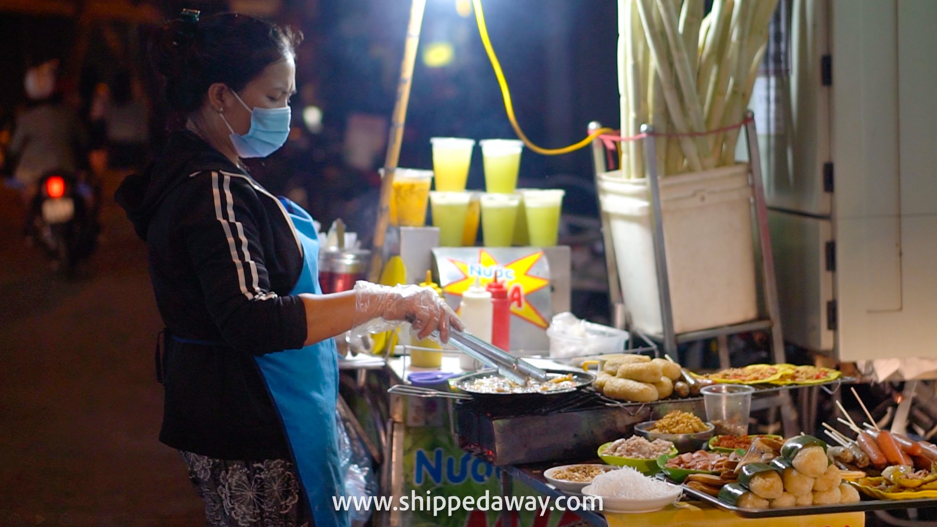 Sausages and sugarcane juice at Old Quarter Night Market, Hanoi, Vietnam