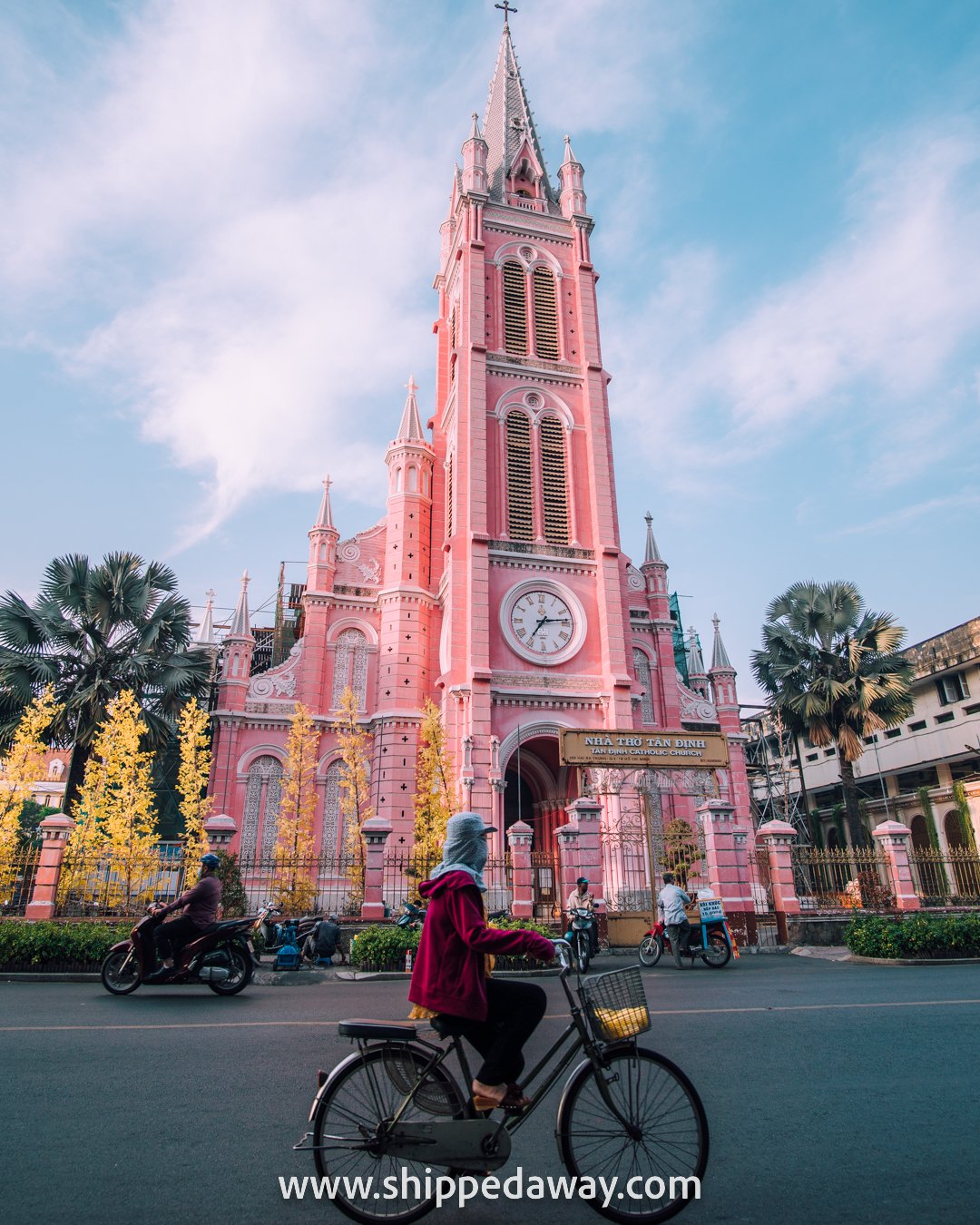 Busy street in front of the Pink Church in Ho Chi Minh City, Vietnam
