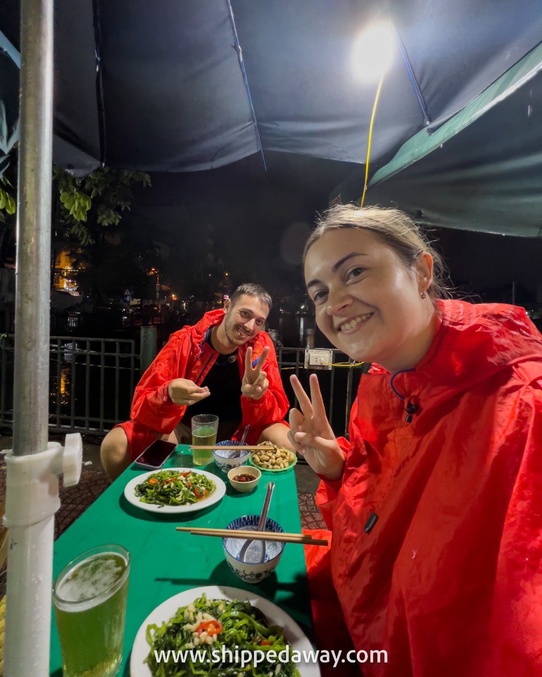 Arijana Tkalcec and Matej Span at their favorite local street food spot in Ba Dinh, Hanoi, Vietnam
