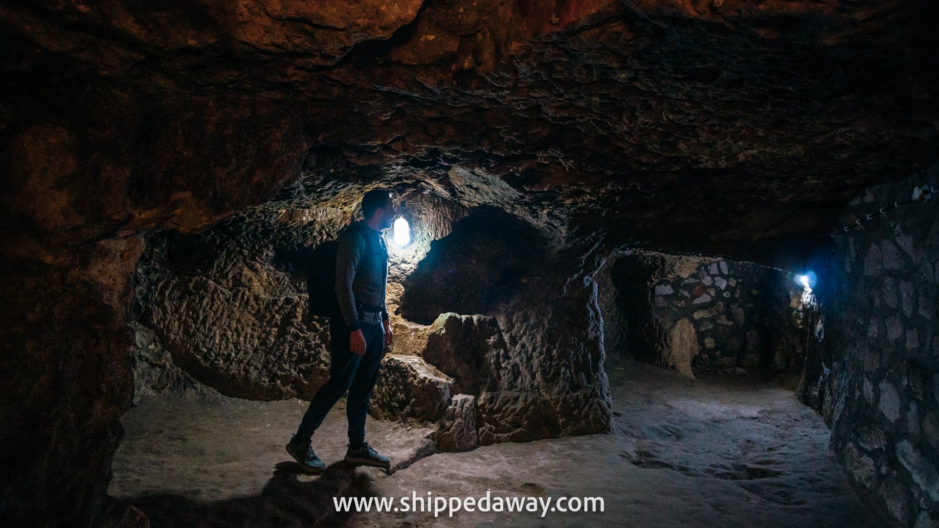 Exploring various stone rooms of Derinkuyu Underground City