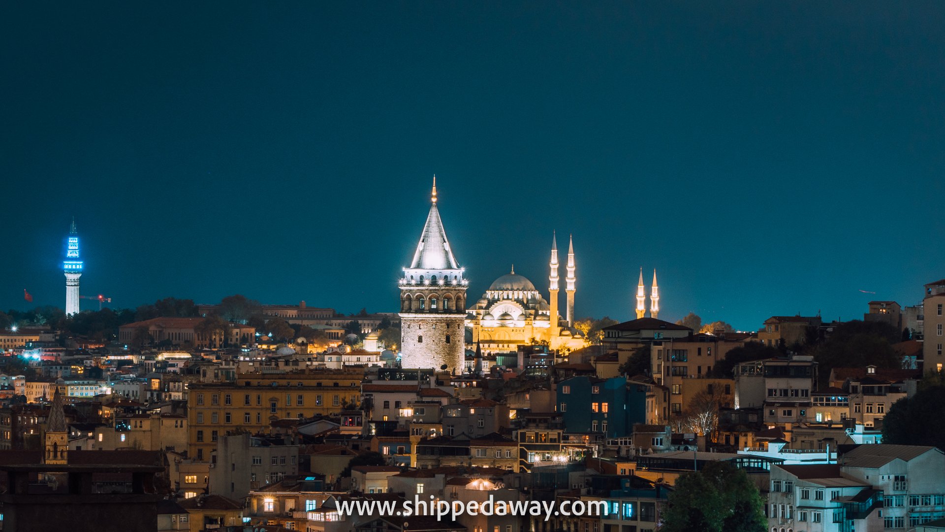 Galata Tower and Suleymaniye Mosque seen at night, Istanbul, Turkey