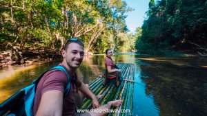 Is Khao Sok Bamboo Rafting worth it? - couple on bamboo raft in Khao Sok National Park Thailand