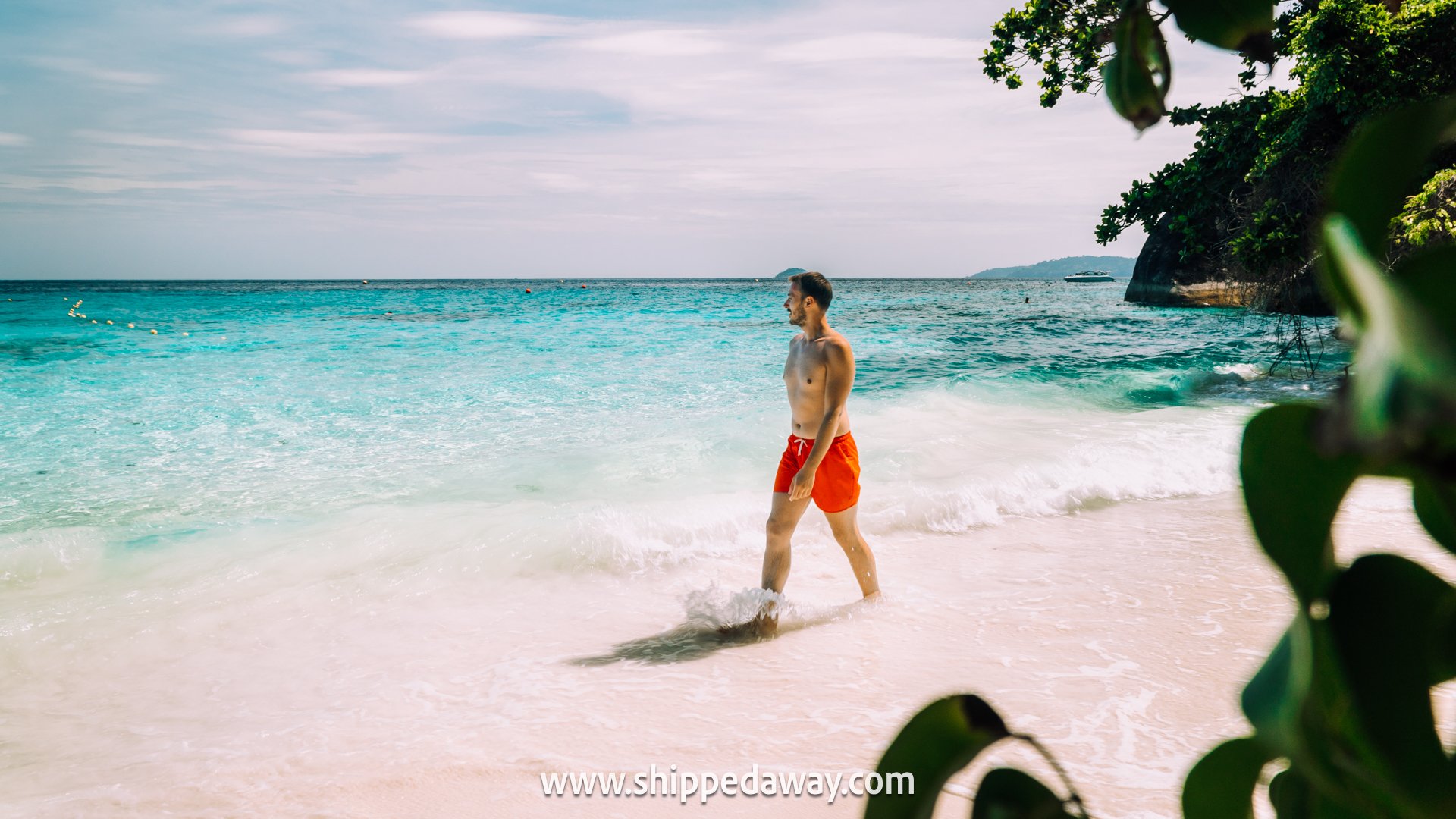 Matej Span walking on the white sand beach at Similan Islands