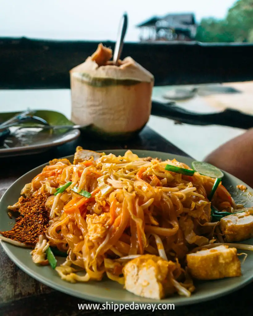 Top Things To Do in Koh Tao, Thailand - Delicious pad thai and coconut at Sai Nuan Beach