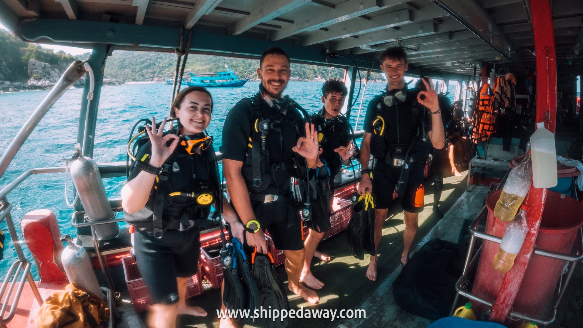 Open Water Scuba Diving Course, Koh Tao, Thailand - in scuba diving gear ready to dive, dive boat