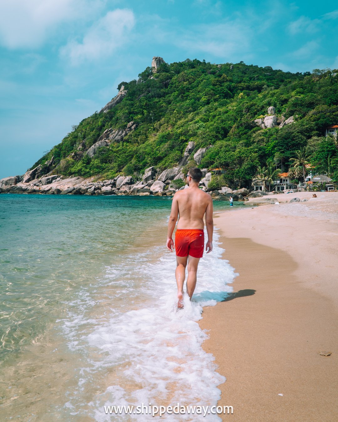 Walking on the beach in Tanote Bay, Koh Tao, Thailand