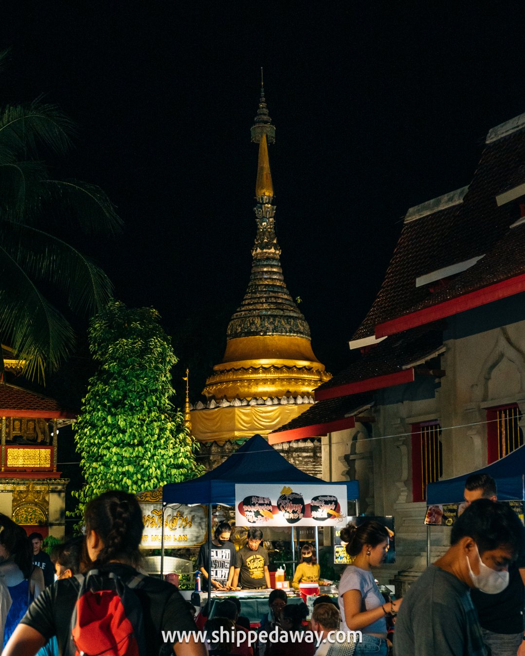 Temple are with food stalls at Chiang Mai Sunday Night Market - Thae Pae Walking Street - Chiang Mai Night Market