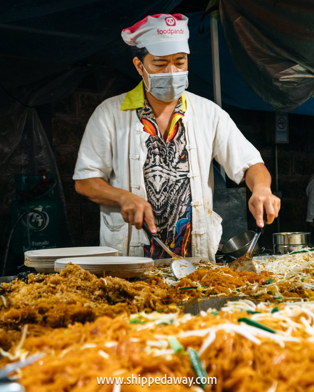 top things to do in Chiang Mai, Chiang Mai attractions - pad thai prepared on a street food stall at Sunday Night Market - Chiang Mai night markets