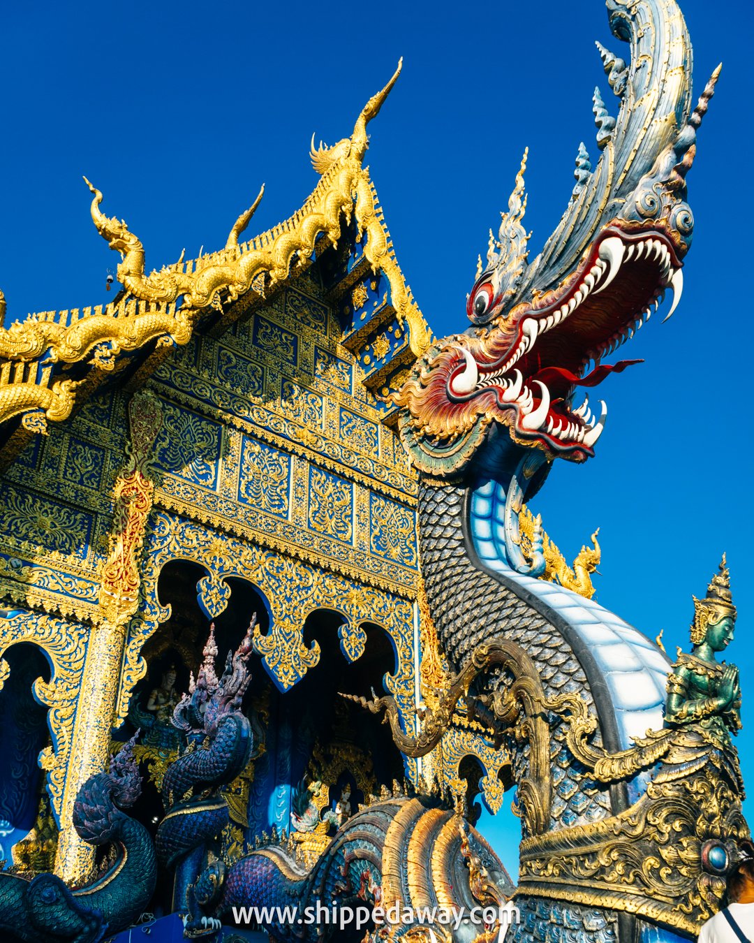 stairs with nagas chiang rai, Wat Rong Suea Ten, Blue Temple Chiang Rai, Chiang Rai temple, Chiang Rai Blue Temple