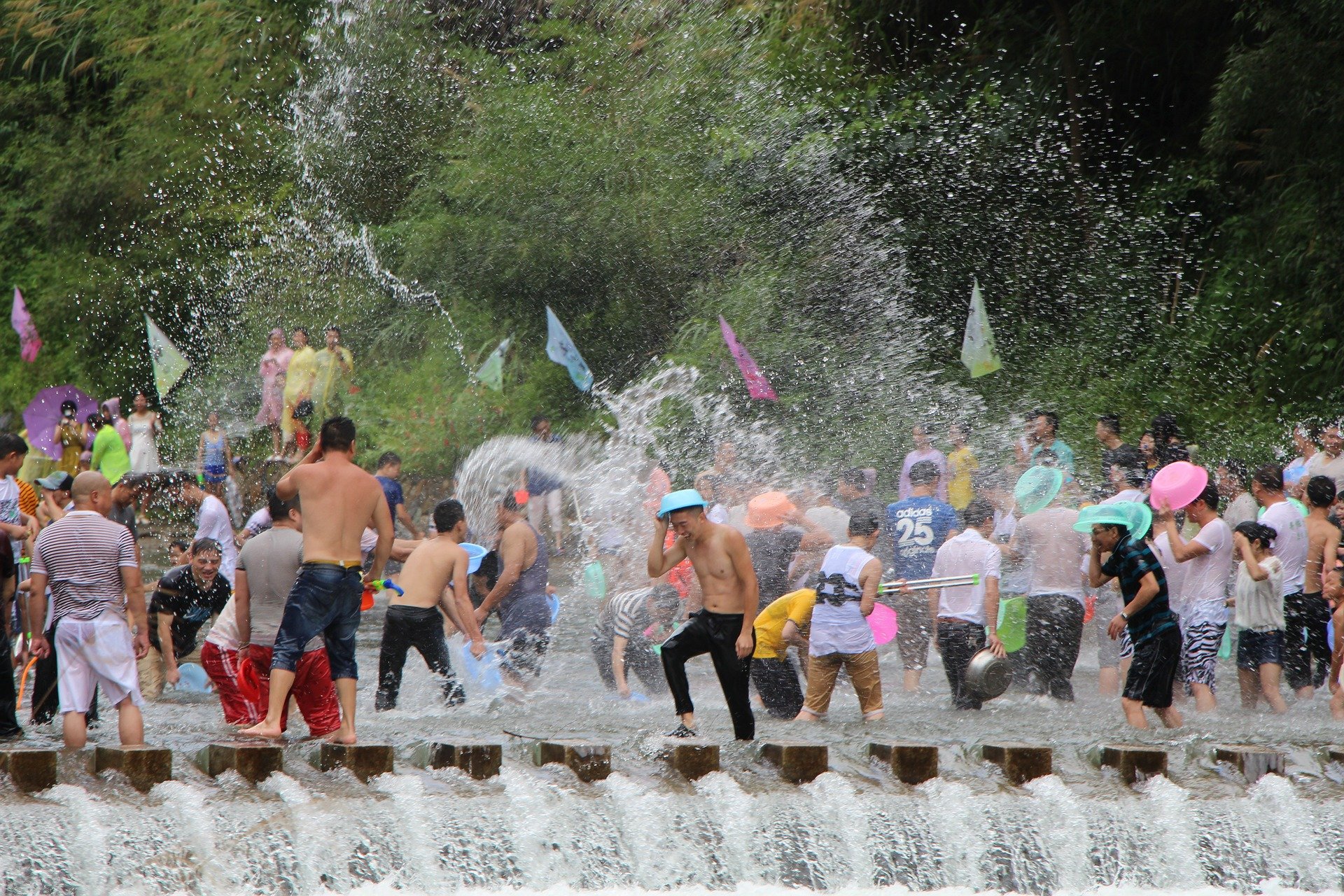 Sustainable celebration of Songkran Festival in Thailand on the riverside