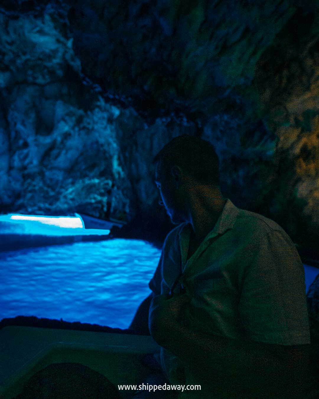 taking photos inside the Blue Cave in Croatia - - Blue Cave Island Hopping tour from Split or Brač