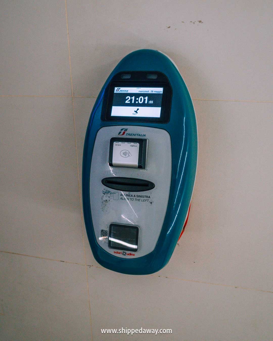 Getting around Cinque Terre by train - ticket validing machine