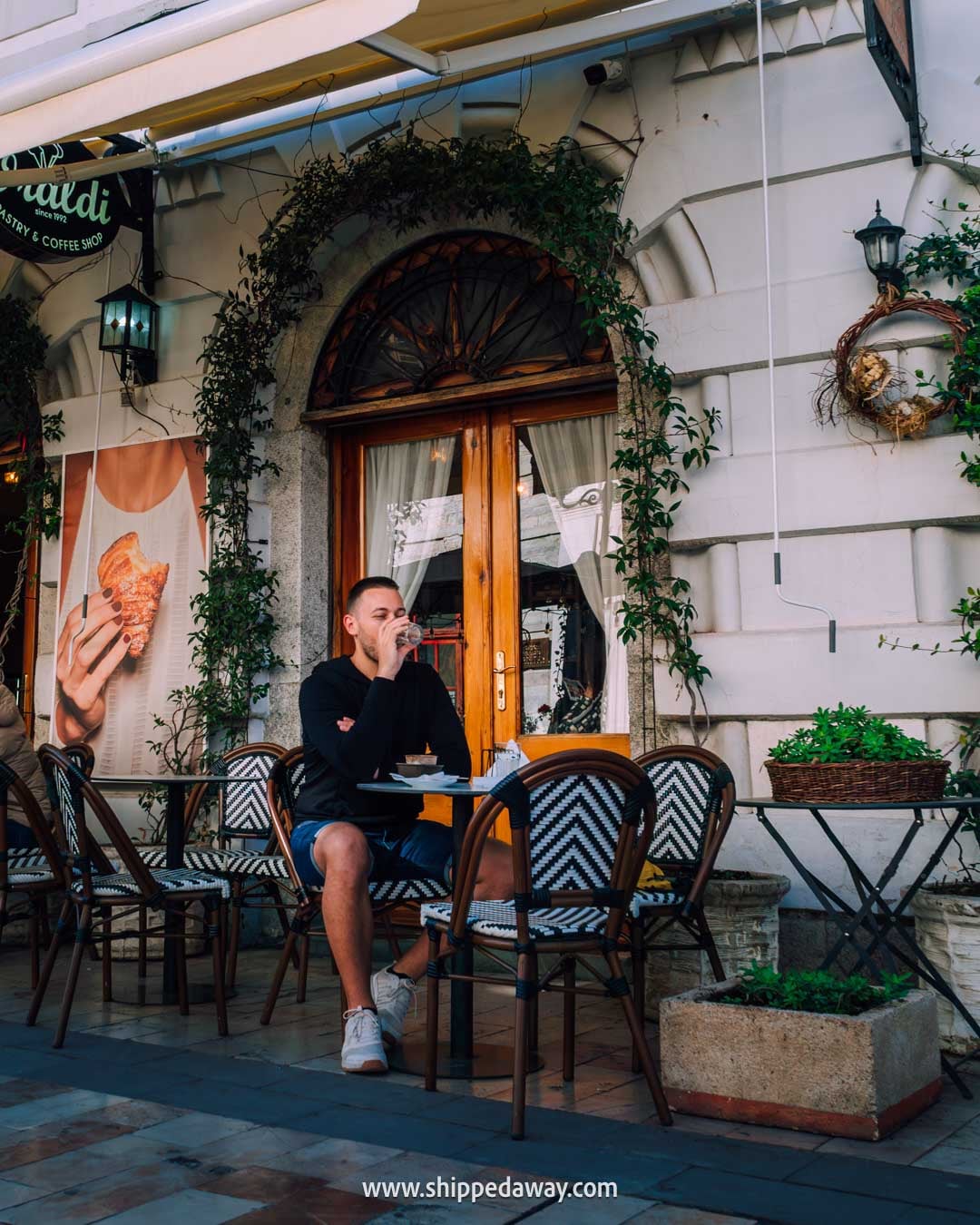 Things to do in Shkoder, Albania - what not to miss in Shkoder - sitting at a cafe on Kole Idromeno Street