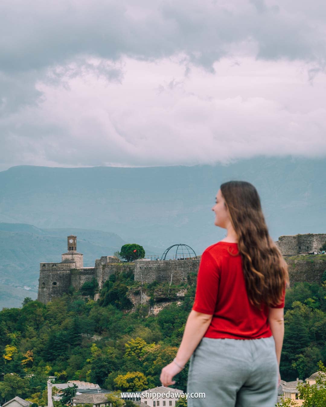 What to see in Gjirokaster, Albania's Stone City - things to do in Gjirokaster, Albania - views of the castle from upper streets