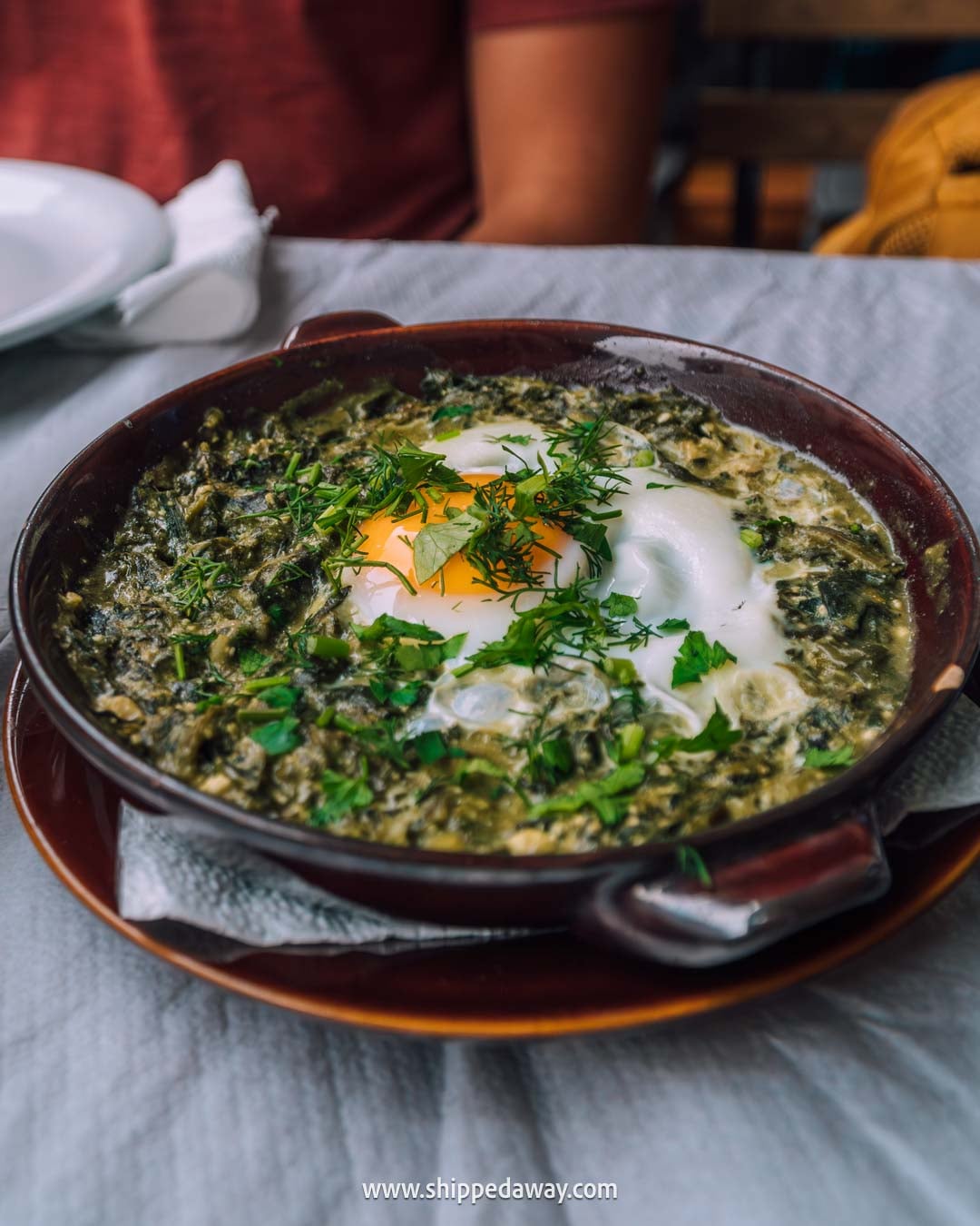 What to see in Gjirokaster, Albania's Stone City - things to do in Gjirokaster, Albania - trying traditional Albanian food - restaurant - spinach casserole with eggs