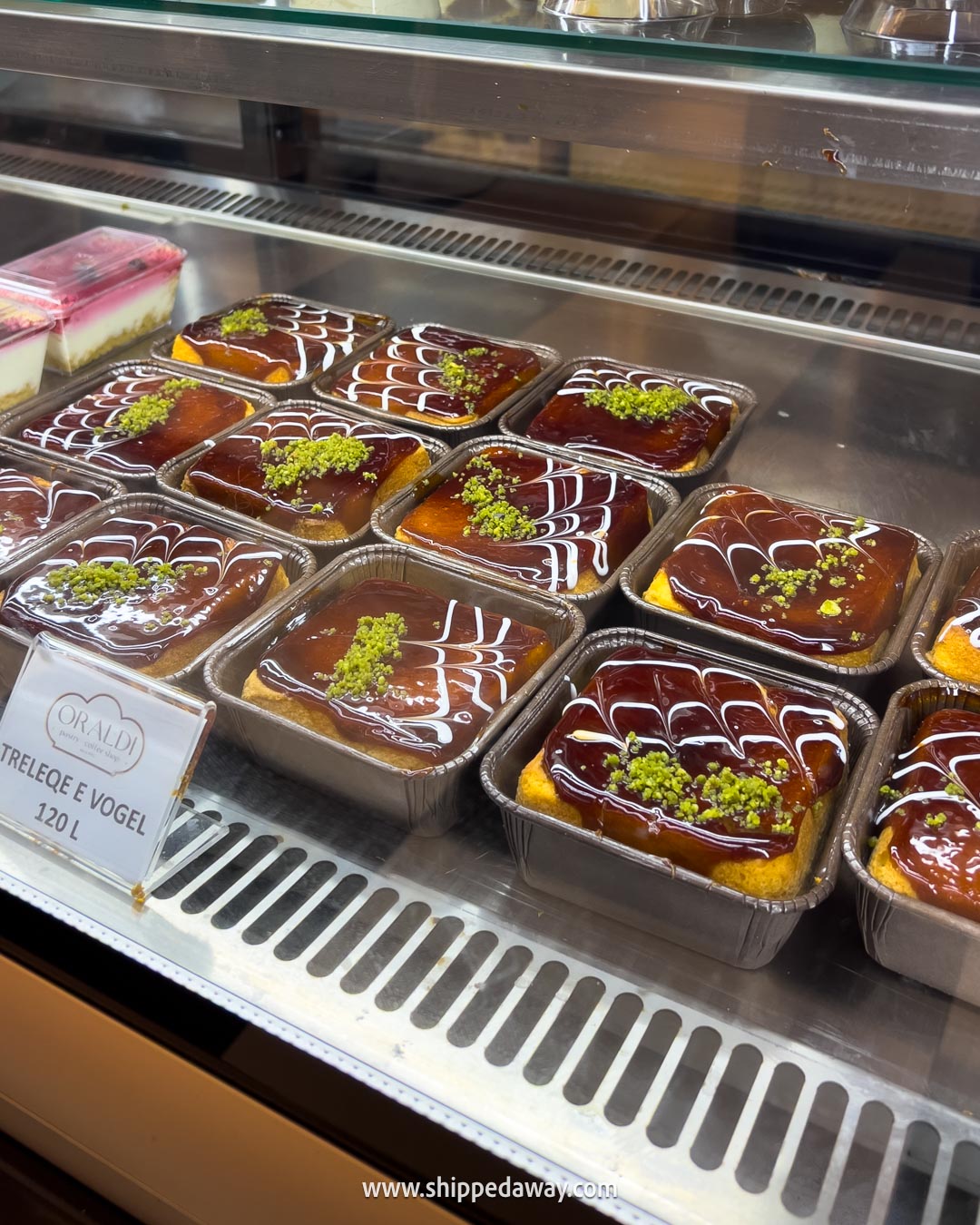 Things to do in Shkoder, Albania - what not to miss in Shkoder - trilece Albanian dessert in Kole Idromeno Street