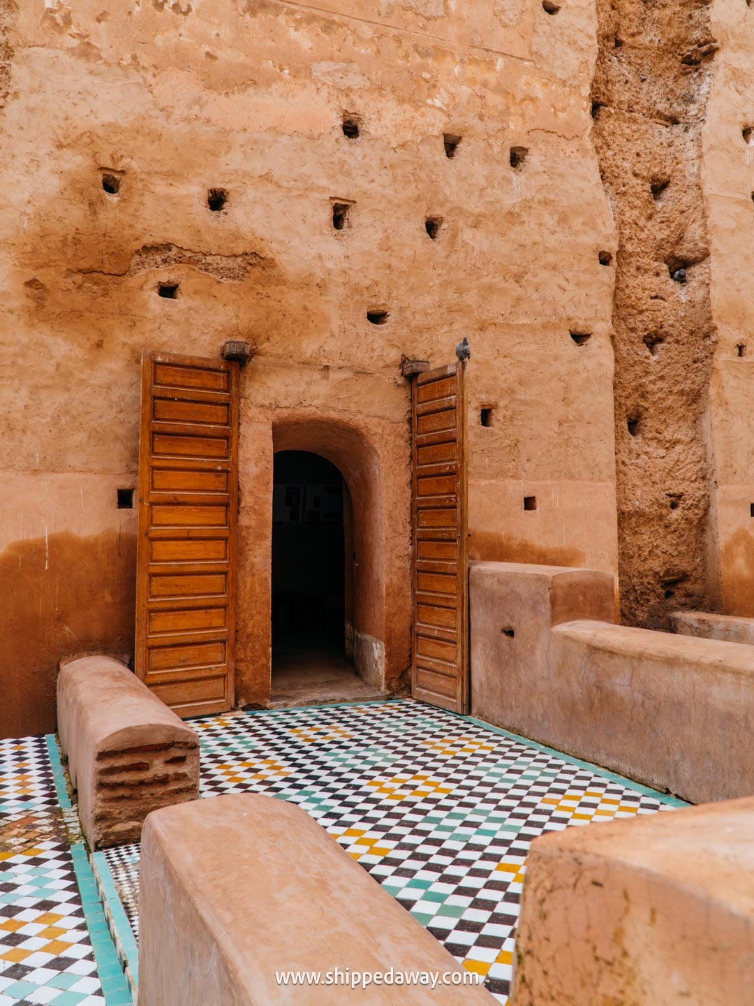 Things to do in Marrakesh, Morocco - tiles at the lower area of El Badi Palace
