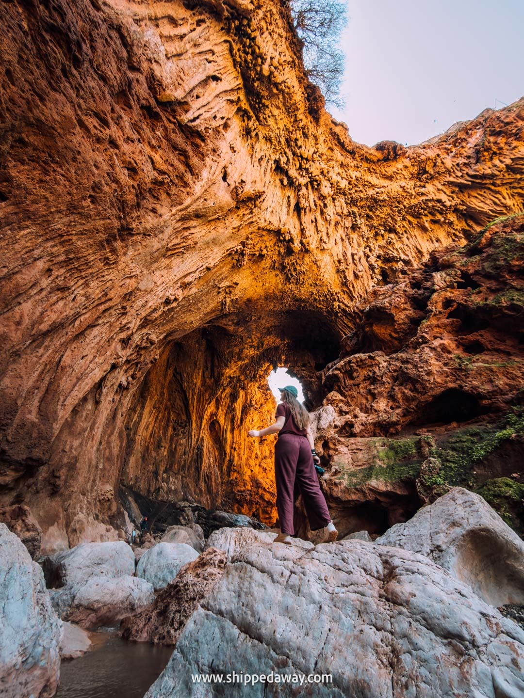 Our tips for visiting Iminifri Natural Bridge in Morocco - huge size of the bridge seen below
