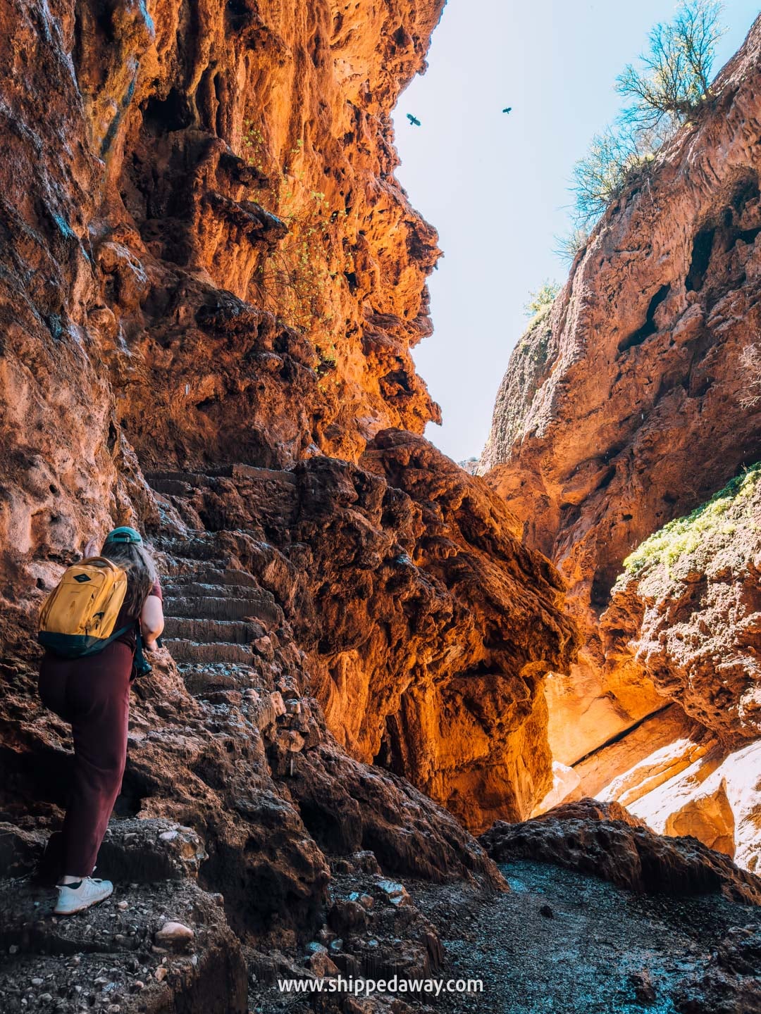 Our tips for visiting Iminifri Natural Bridge in Morocco - climbing up rocky stairs