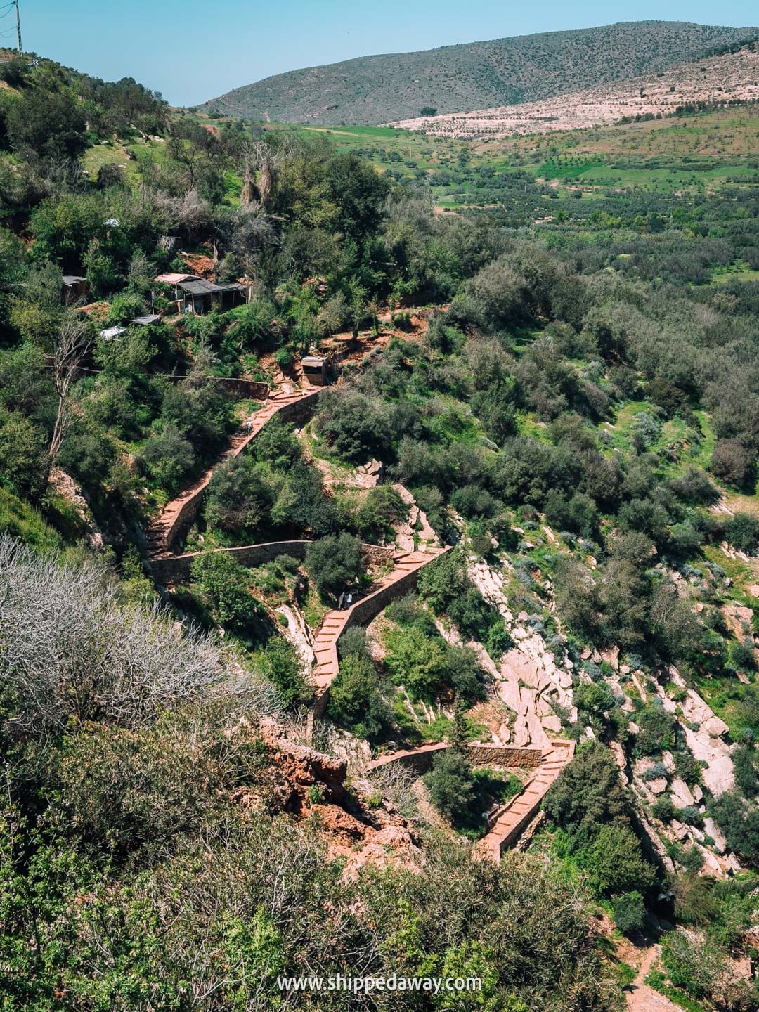 Our tips for visiting Iminifri Natural Bridge in Morocco - zig-zag stairs leading to the river