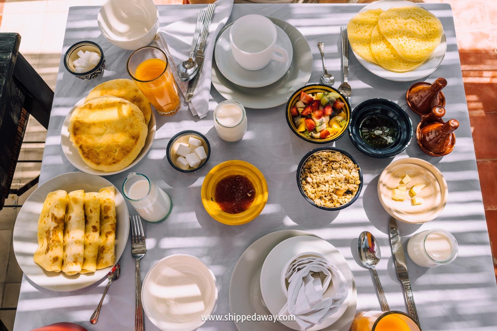 Things to do in Marrakesh, Morocco - table with traditional Moroccan breakfast