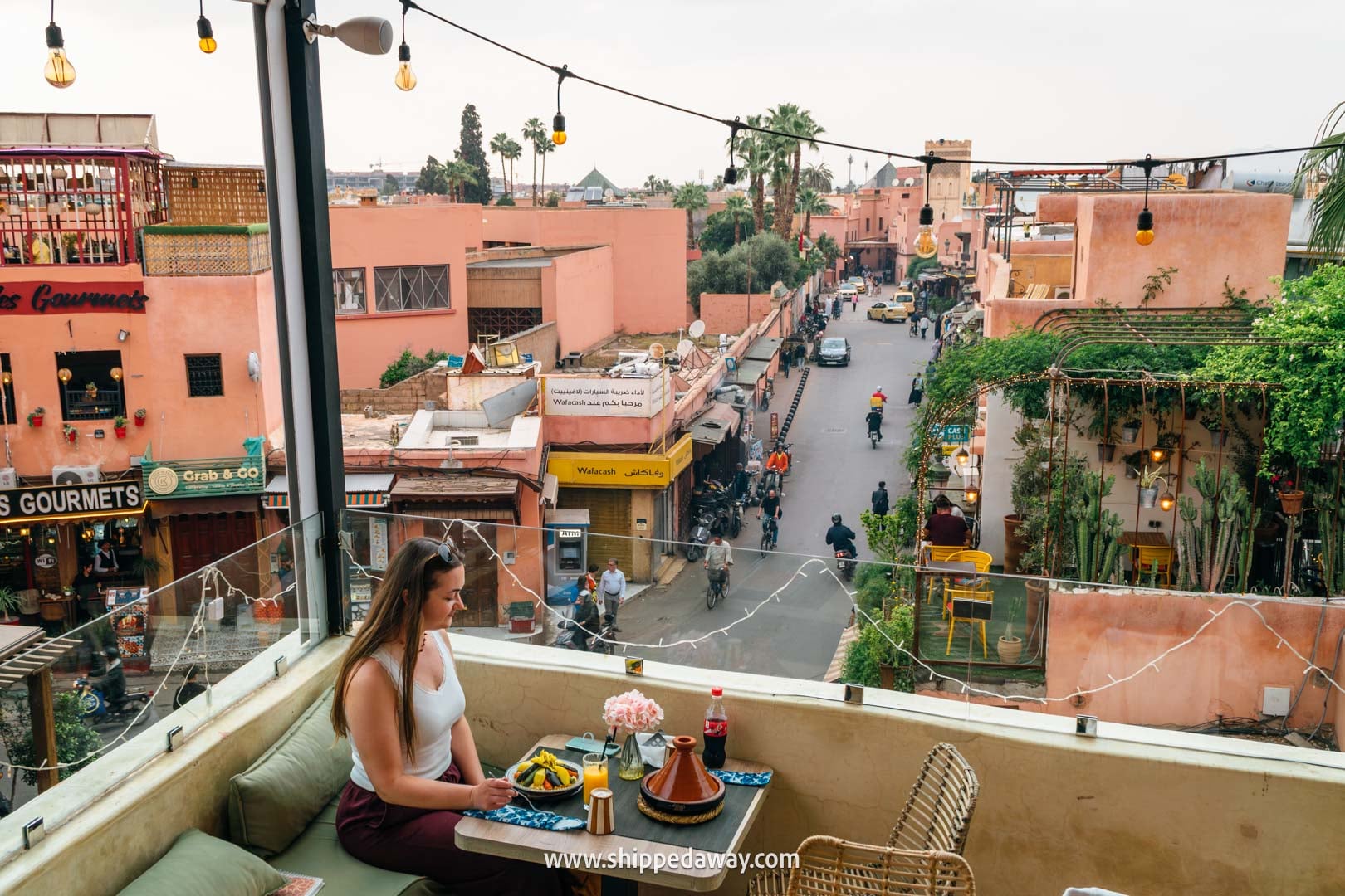 Things to do in Marrakesh, Morocco - enjoying traditional Moroccan food in a rooftop restaurant in the medina