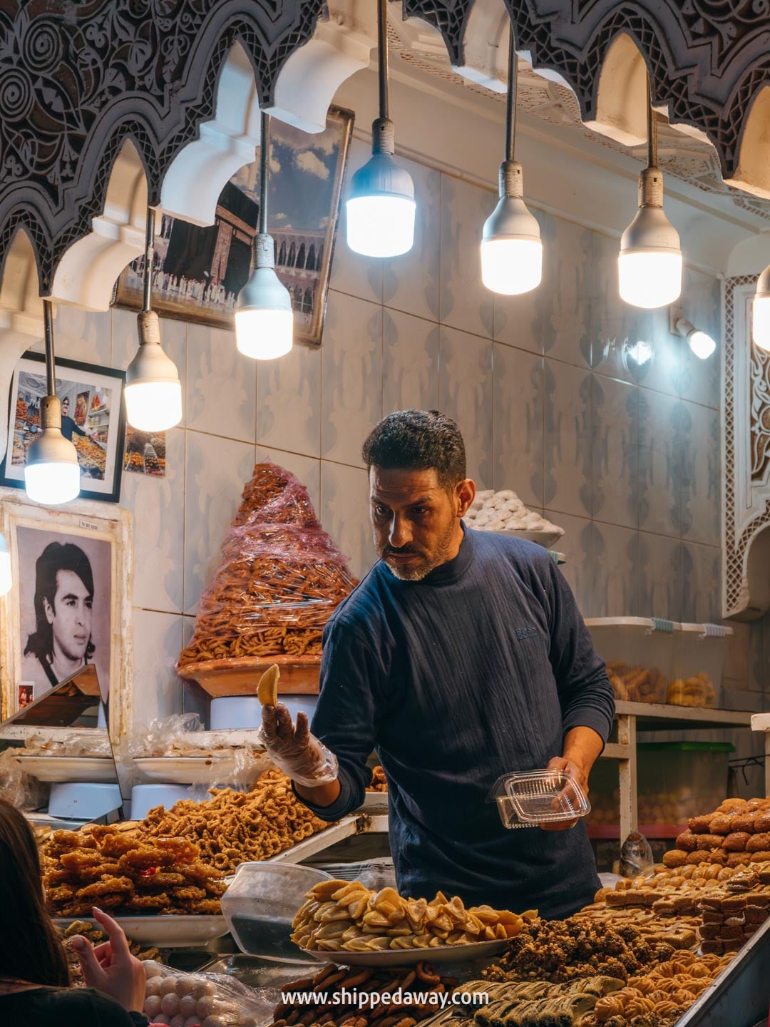 Things to do in Marrakesh, Morocco - walking through souks of the medina - dried fruit and candy shop