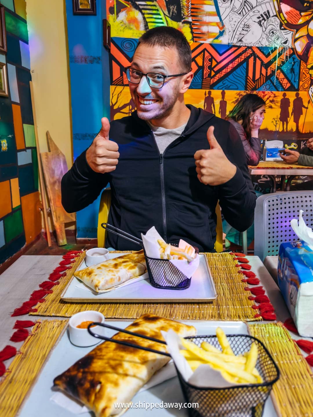Ait Benhaddou Travel Guide - How to visit Ait Benhaddou - enjoying a meal at a fast food place