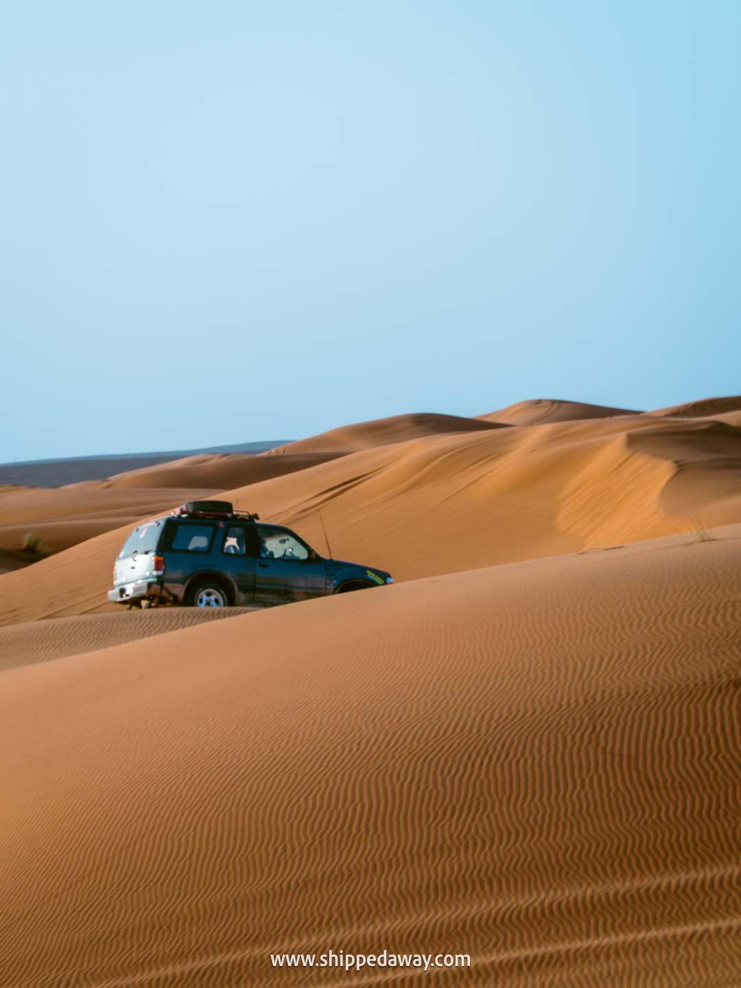 4x4 car in Merzouga sand dunes, Morocco's Desert