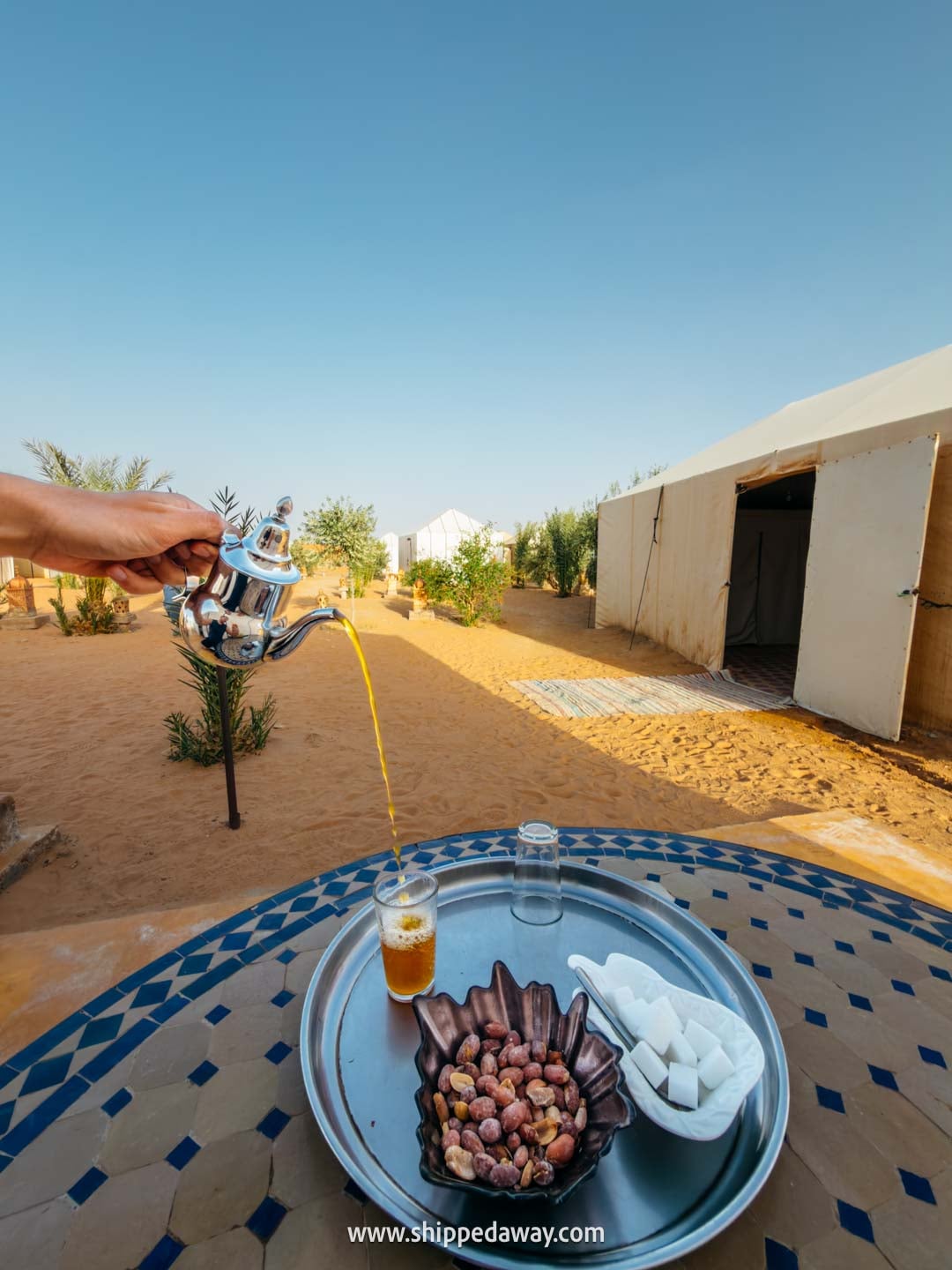 Our experience in a desert camp in Merzouga, Morocco - check-in - mint tea with peanuts