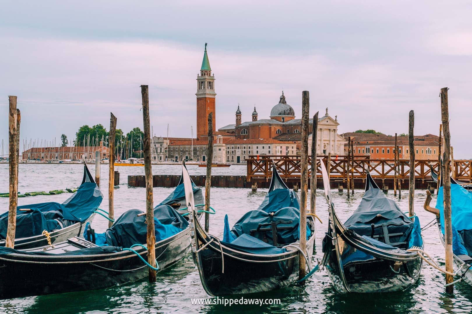 things to do in Venice - tips from our Venice trip - Riva degli Schiavoni with gondolas and views of San Giorgio Maggiore island